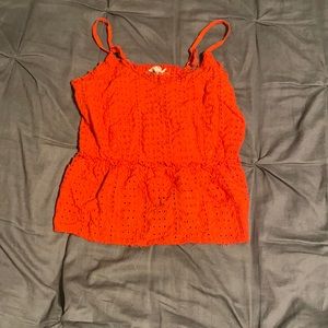 This is a red croped tank, pretty comfy. And a size xs